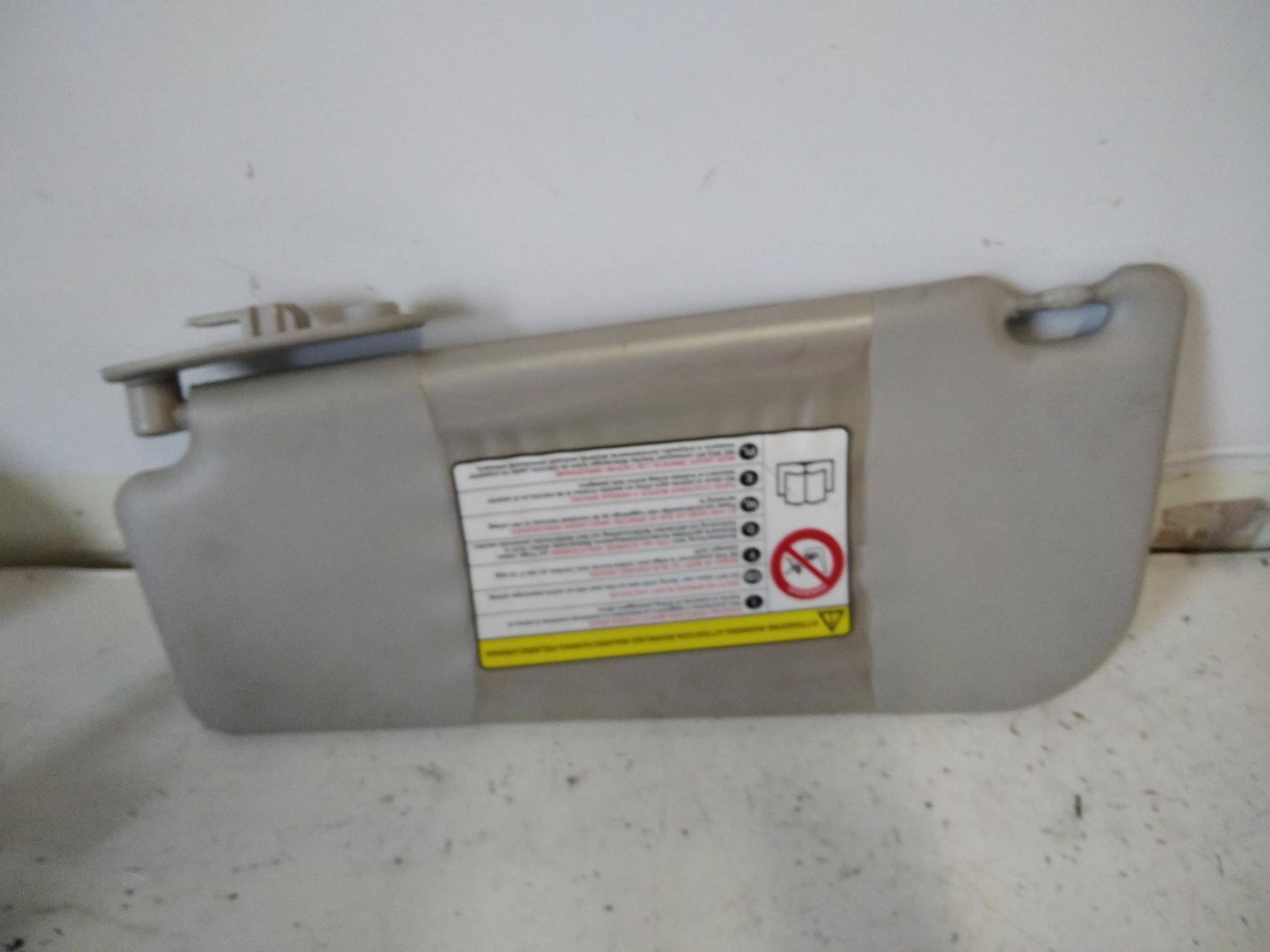 Aletta parasole parabrezza dx.